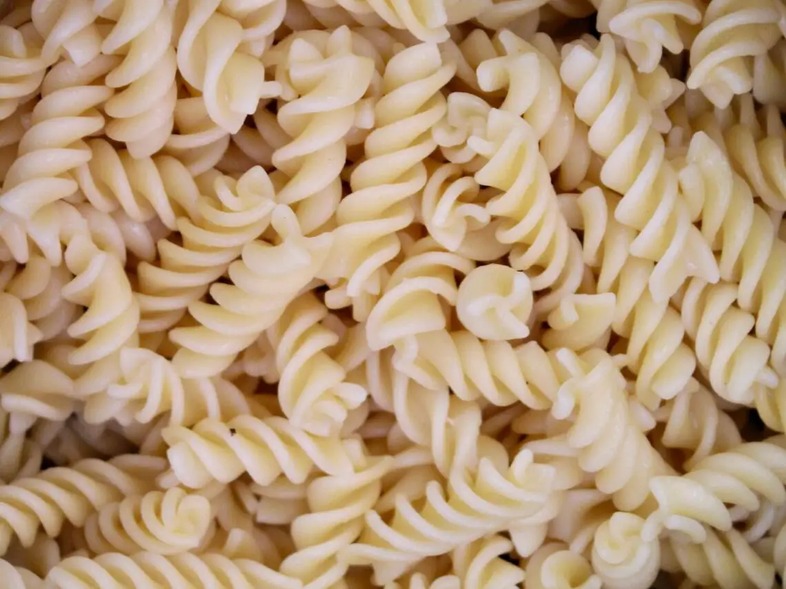 Any pasta that has a lot of nooks and turns because they tend to hold in more sauce. In this case, I would say fusilli pasta. Fusilli is easy to make and holds in a lot of sauce which is perfect for pasta fusilli pasta salad with mayo.